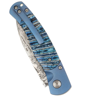 El Rey Damasteel Button Lock — Blue Mammoth Tooth / Blue Anodized Frame — Closed