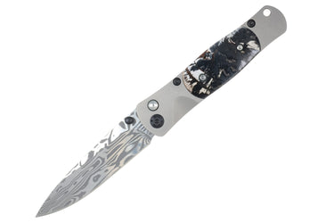 Tesoro Damasteel Button Lock 3½" — White Mammoth Tusk / Black PVD Hardware — Blade Down