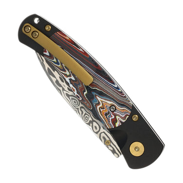 El Rey Damasteel Button Lock – Corvette Fordite, Black Cerakote & Gold PVD Hardware, Black Diamond — studio view